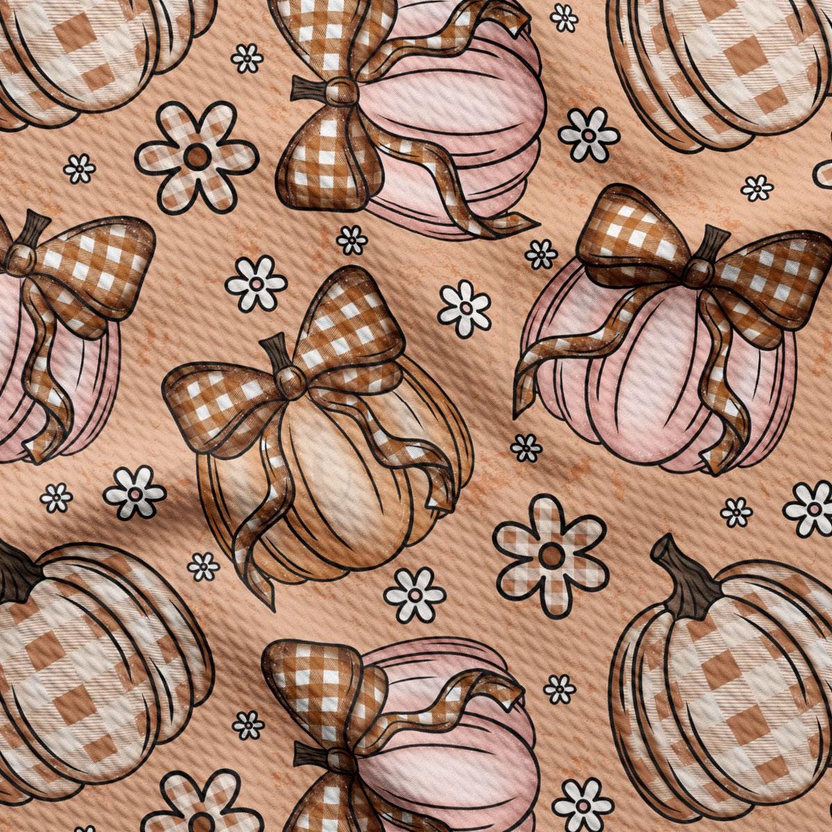 a repeating pattern of brown and white plaid bows and pumpkins against a peach-colored background, with small white flowers scattered throughout.