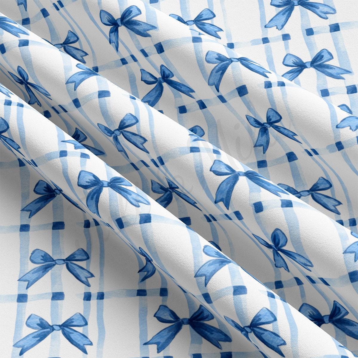 a close up of a blue and white tie