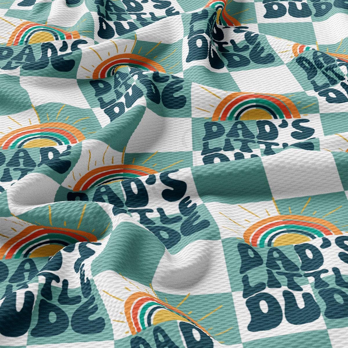 a close up of a checkered fabric with a rainbow