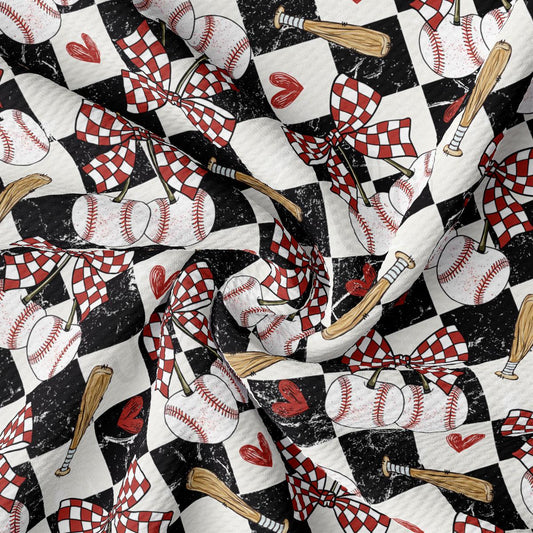 The image is a close-up of a fabric with a repeating pattern of baseballs, bats, and hearts on a black and white checkered background.