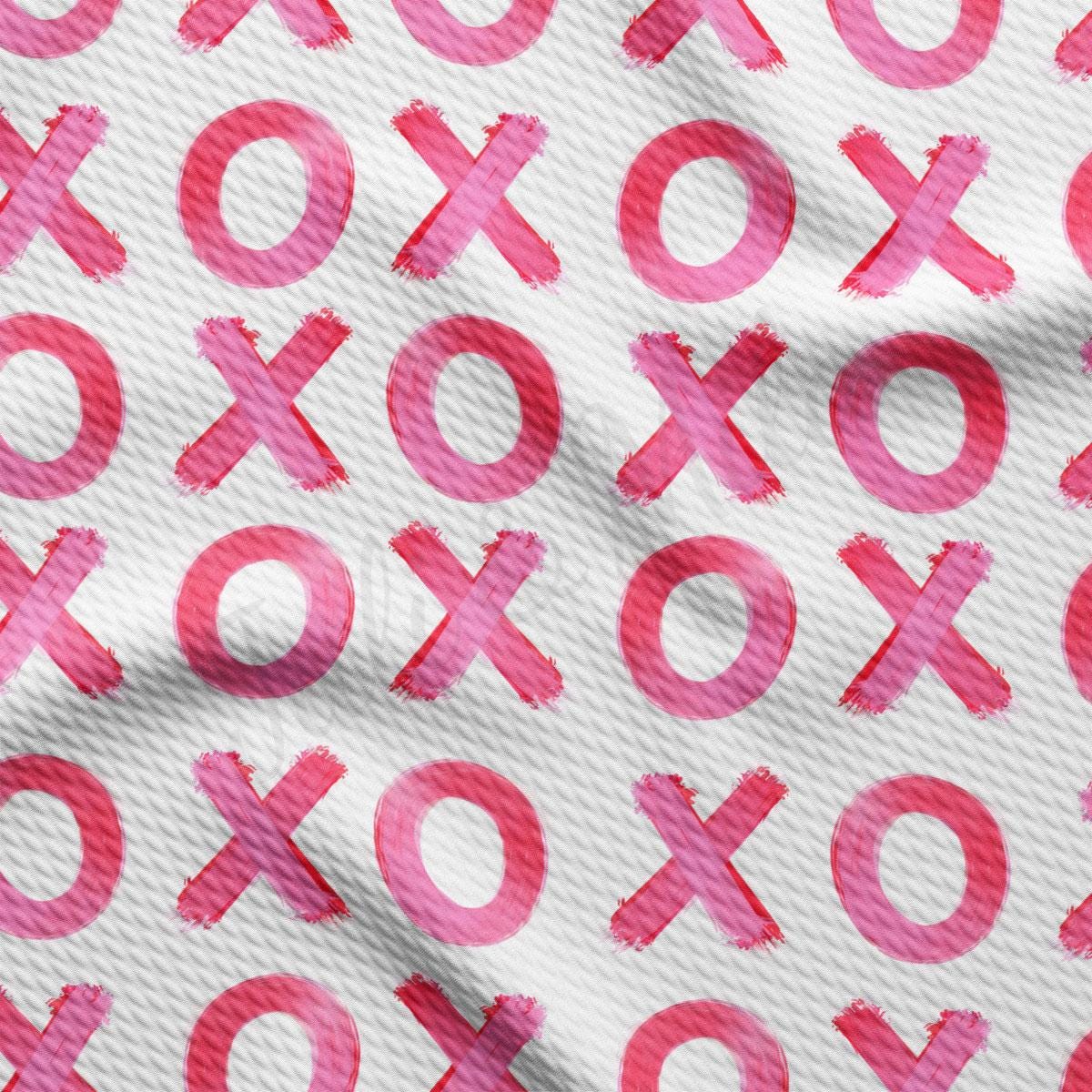 a pattern of pink symbols on a white background