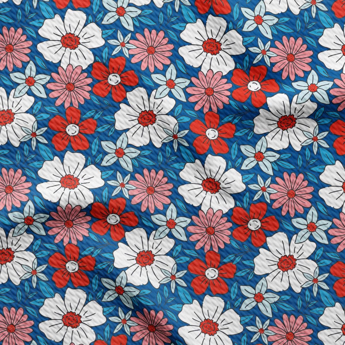 a red, white, and blue flower pattern on a blue background