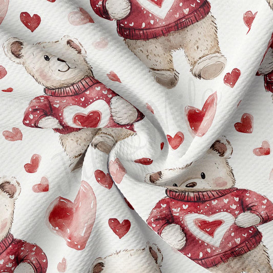 a close-up view of a fabric with a repeating pattern of teddy bears wearing red sweaters with hearts on them.