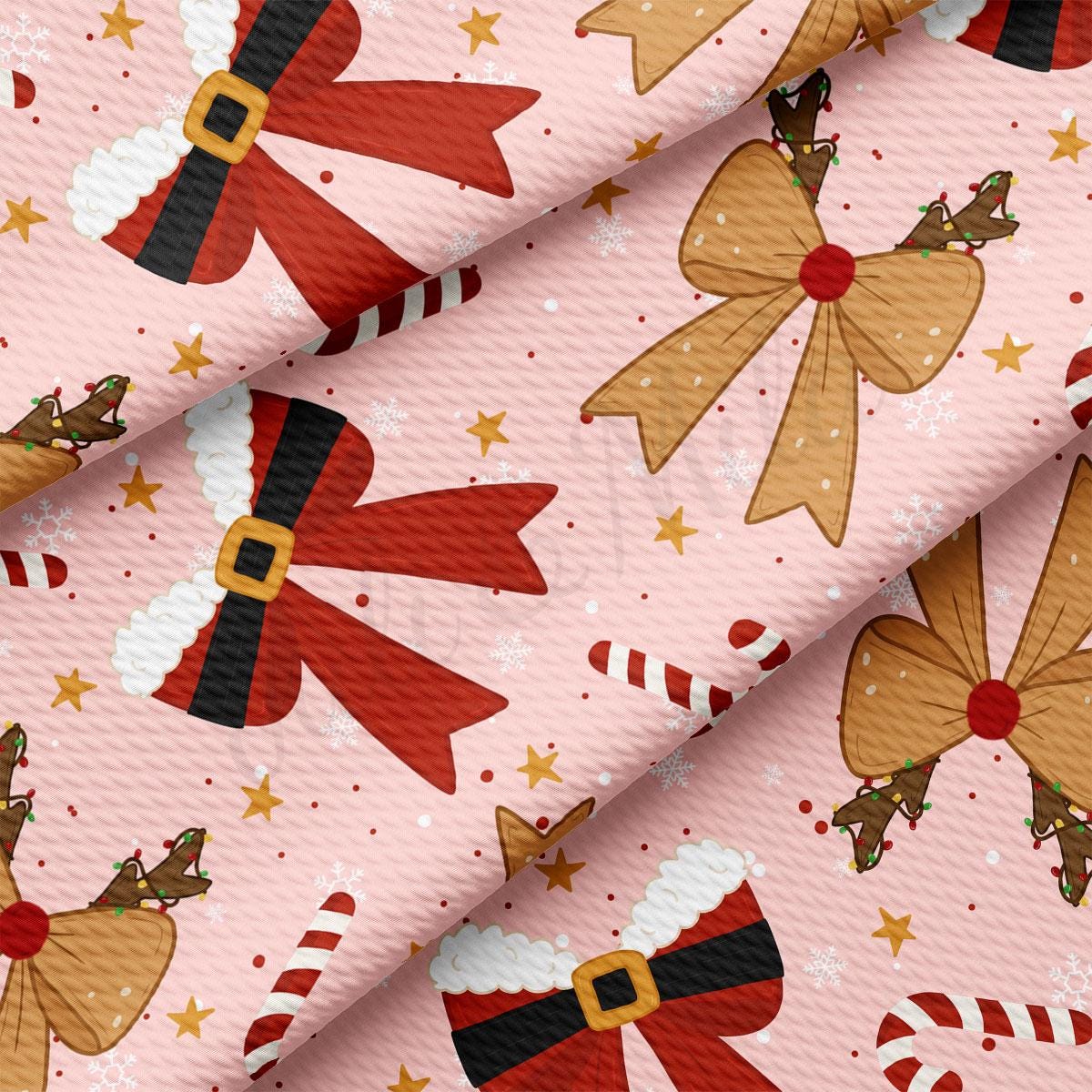 a festive pattern with various Christmas-themed elements, including bows, candy canes, and snowflakes, all set against a pink background.