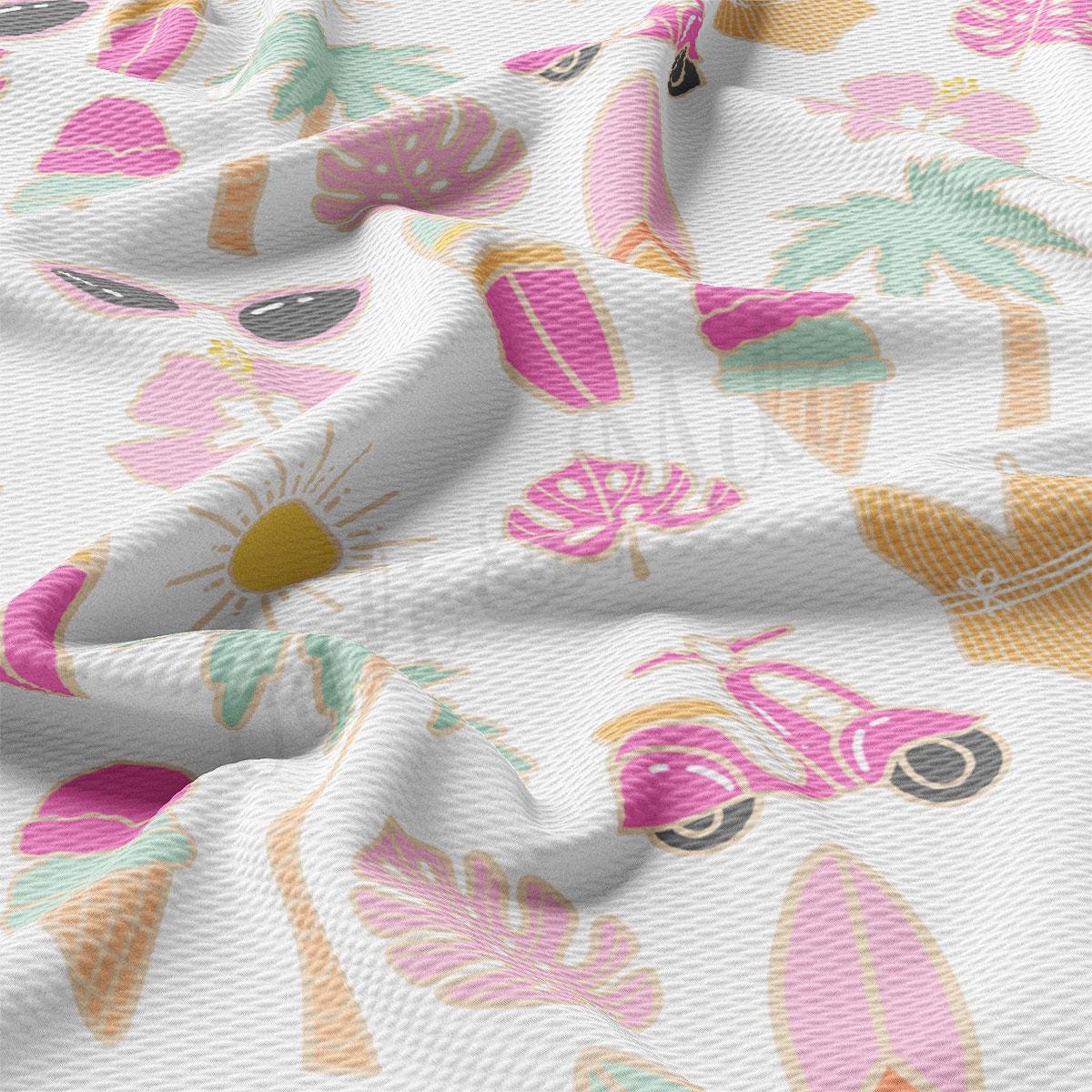 a close up of a white fabric with pink and green flowers