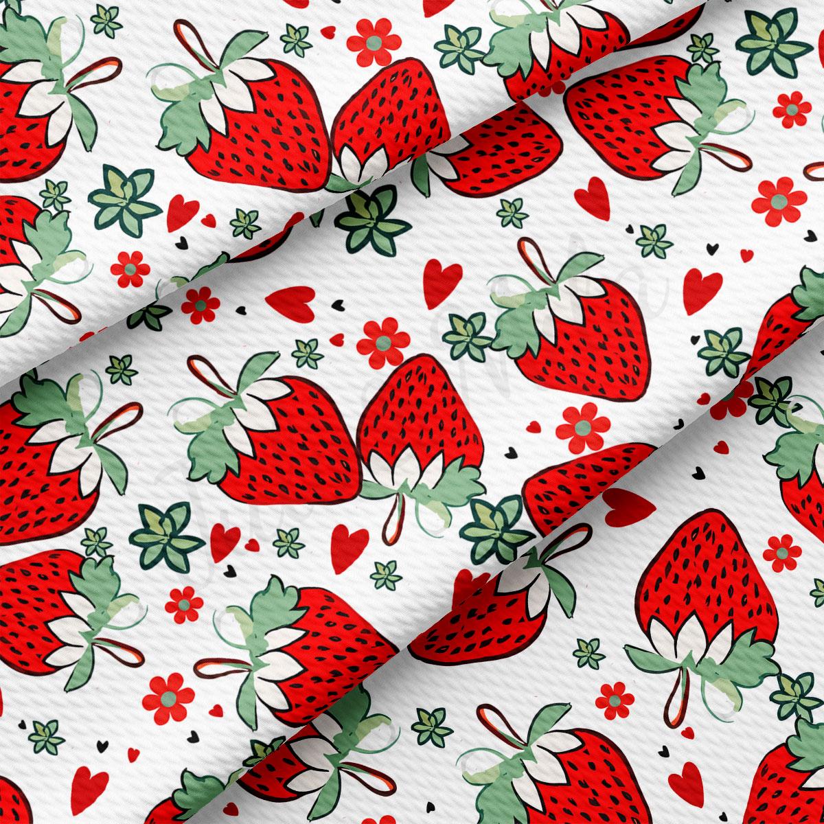 a repeating pattern of red strawberries with green leaves and flowers on a white background.