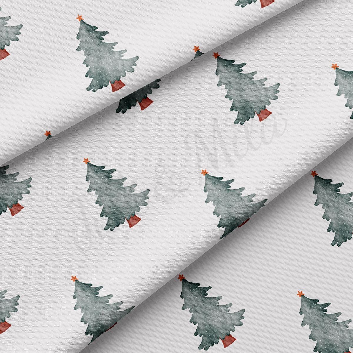 a watercolor christmas tree pattern on a white background