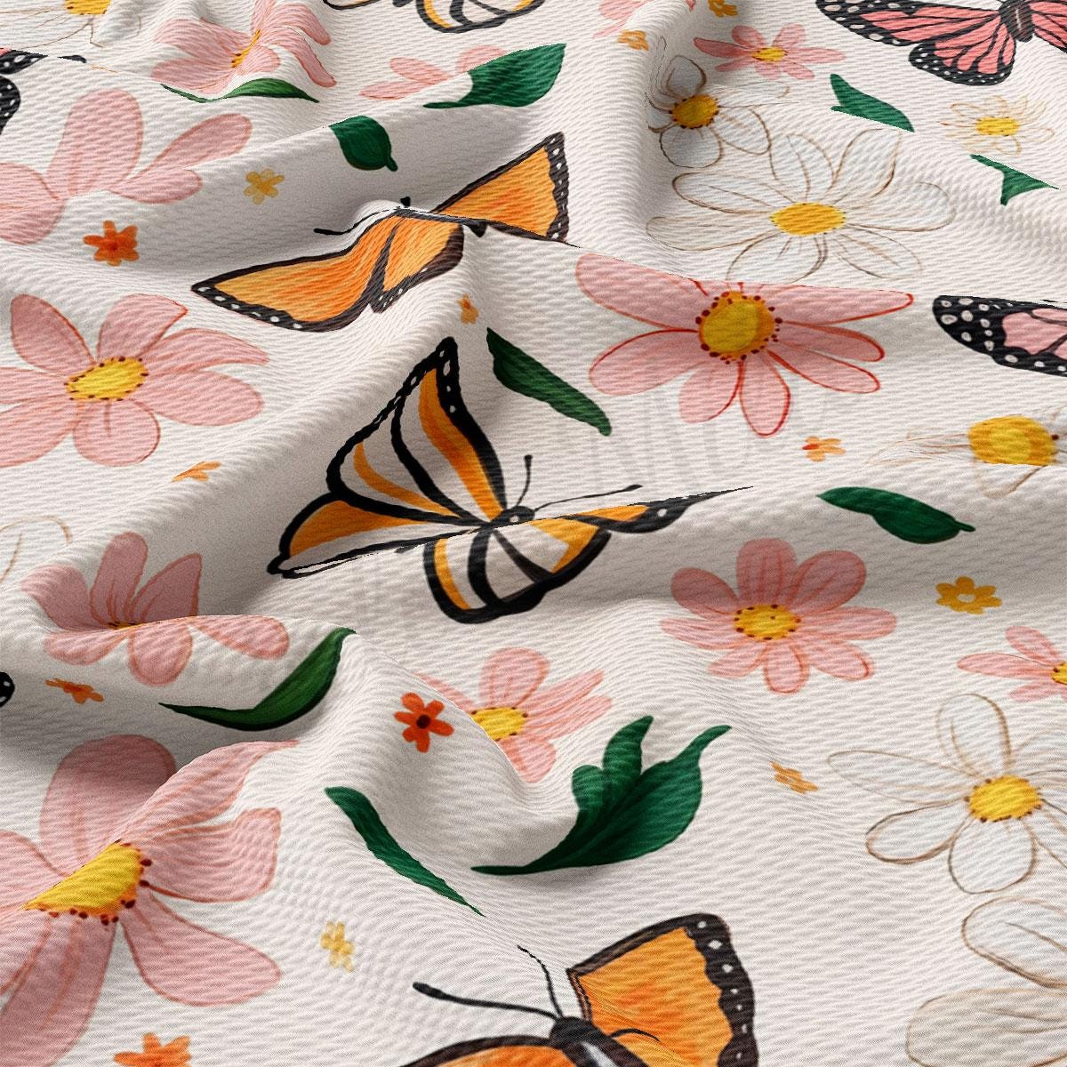 a close up of a flower and butterfly print fabric