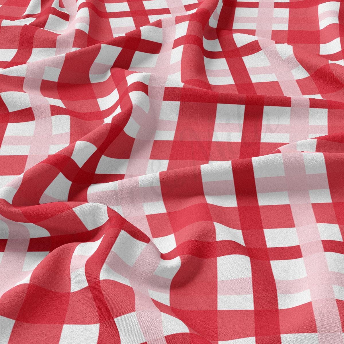 a red and white checkered fabric is shown