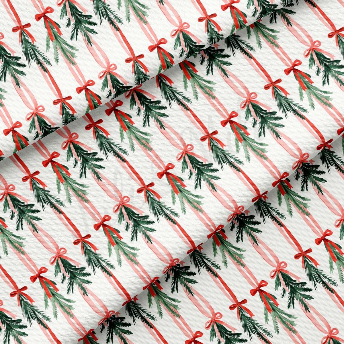a repeating pattern of Christmas trees with red bows, creating a festive and holiday-themed design.
