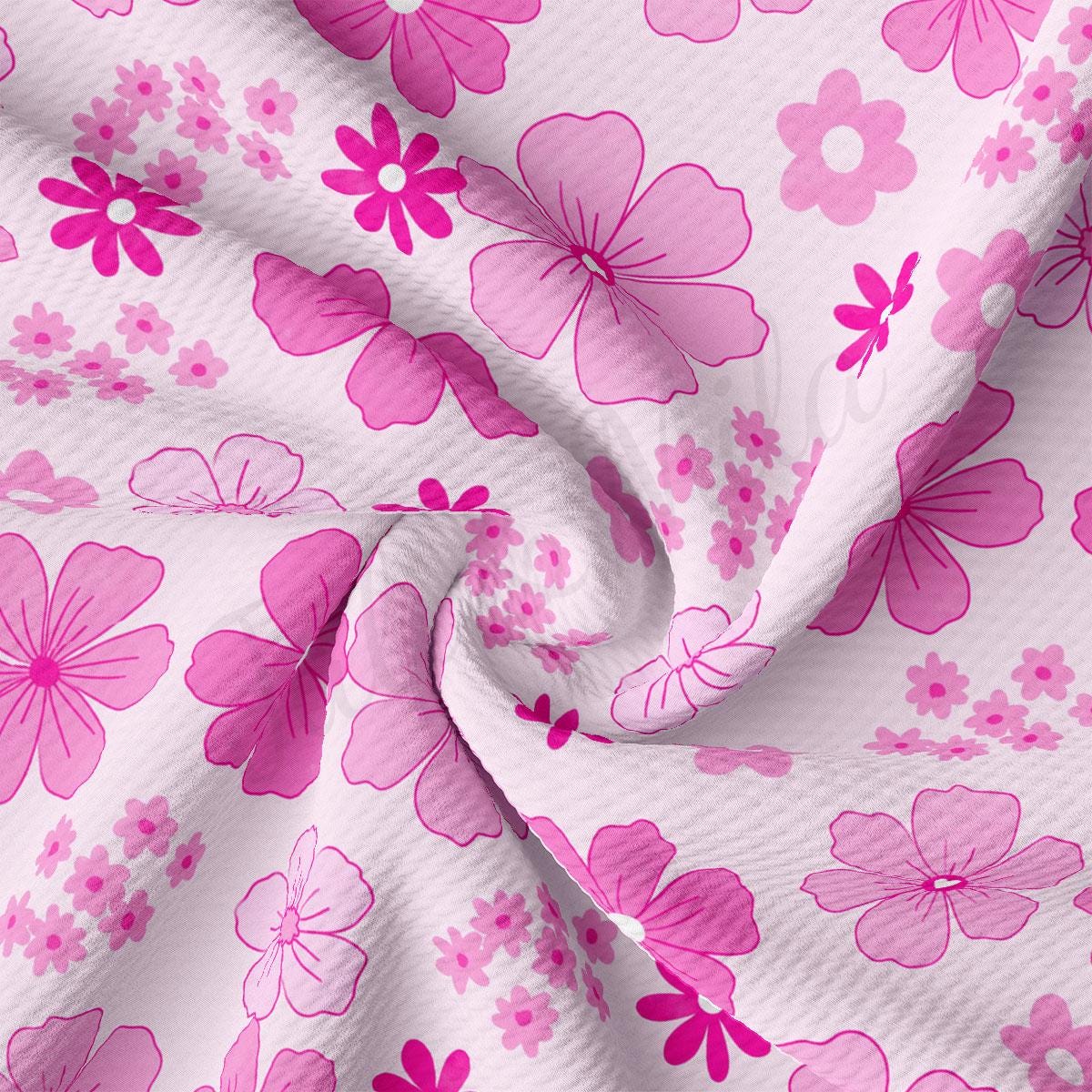 a pink and white flower print fabric