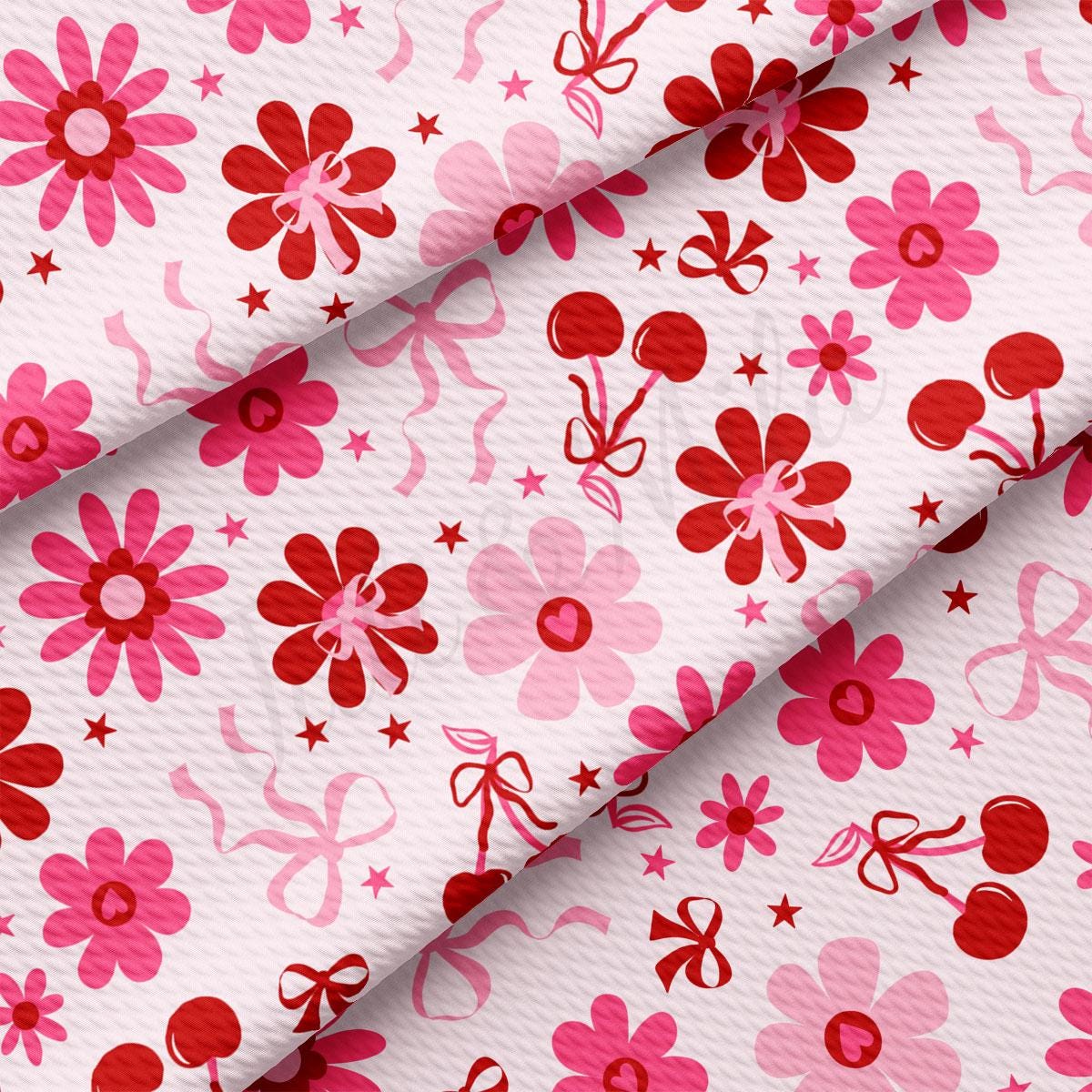 a pink and red flower pattern on a white background