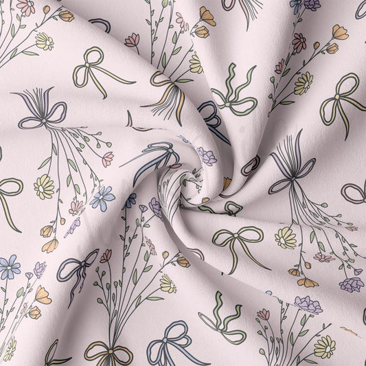 a white fabric with a flower pattern on it