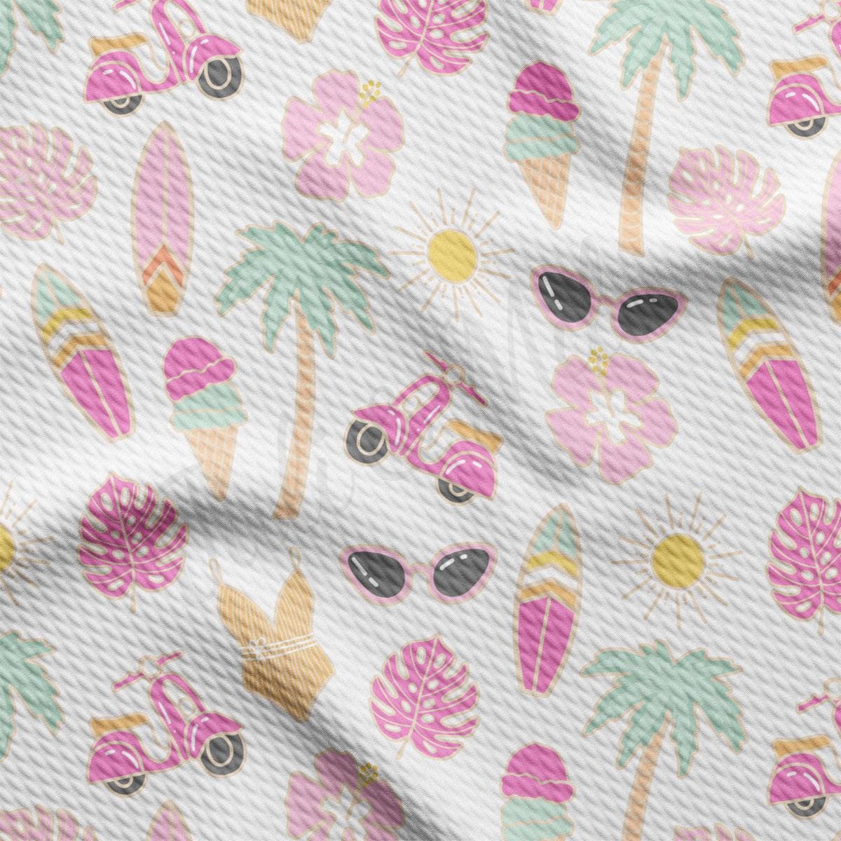 a close up of a white fabric with a pattern of pink, yellow and green