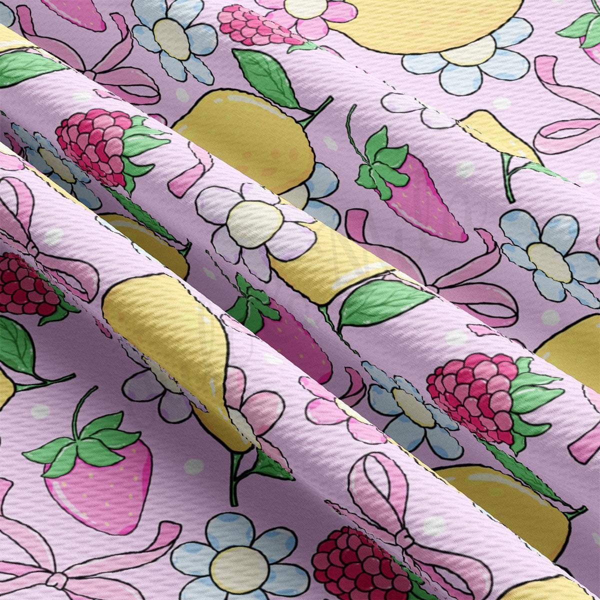 a close up of a pink flowered fabric