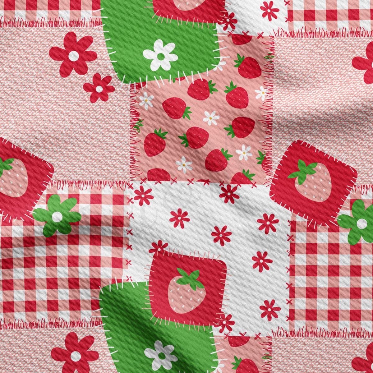 a red and white checkered table cloth with strawberrys on it