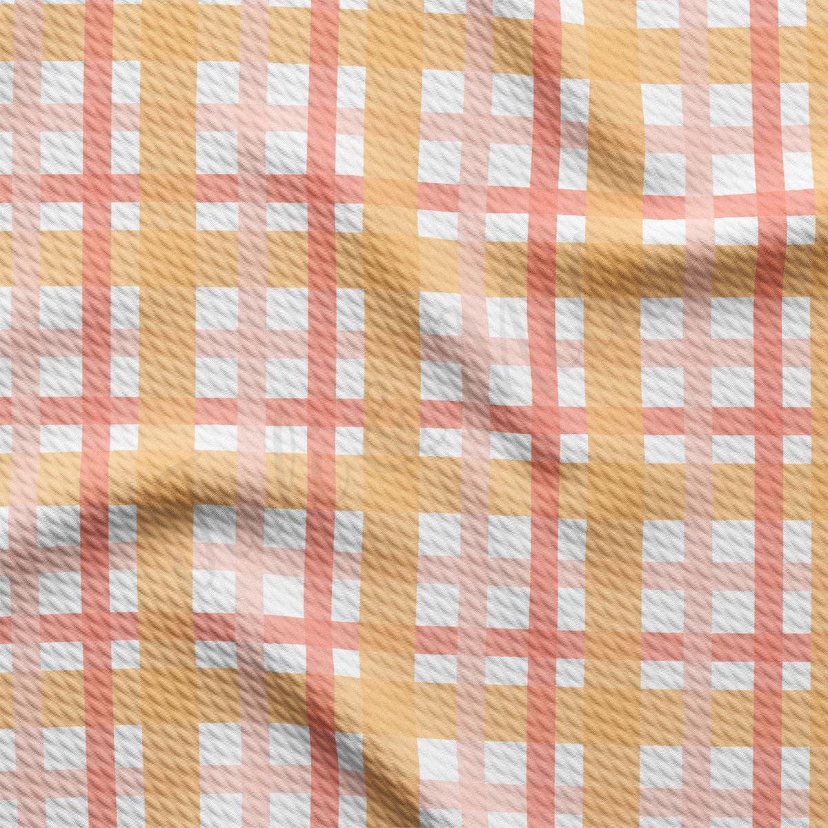 a yellow and white checkered fabric is shown