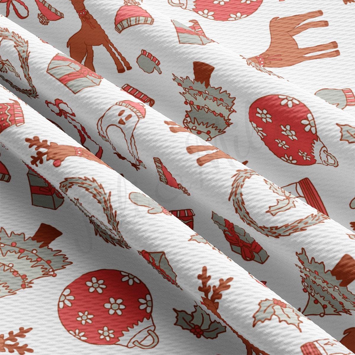 a close up of a white and red christmas wrapping paper