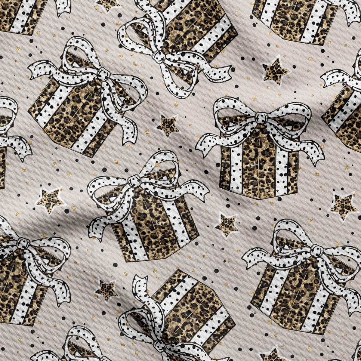a repeating pattern of leopard print gift boxes with white bows, set against a light gray background with scattered gold stars.