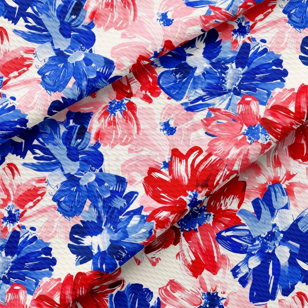 a red, white and blue floral print fabric