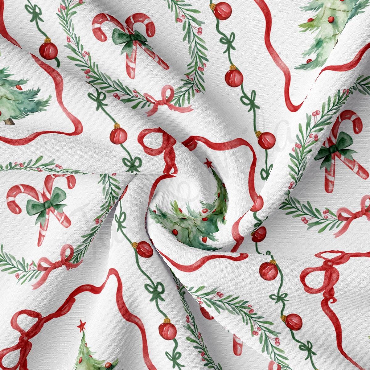 The image is a close-up of a fabric with a repeating pattern of Christmas-themed elements, including candy canes, Christmas trees, and red bows.