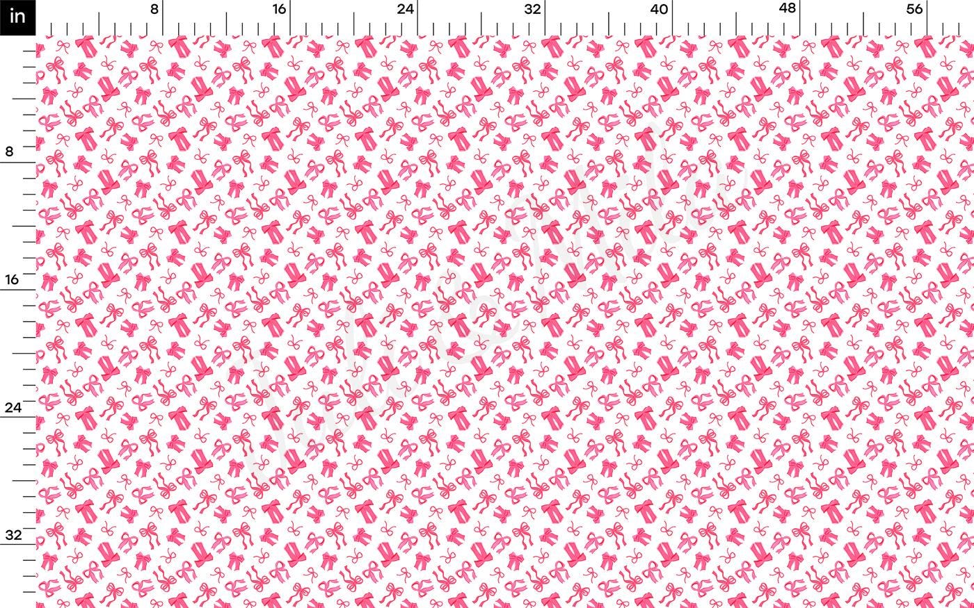 a ruler with a pink and white pattern on it