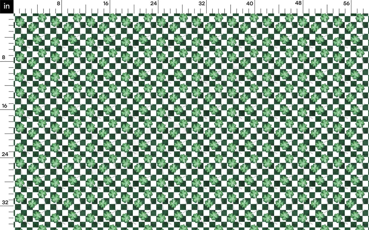 a black and white checkered pattern with green dots