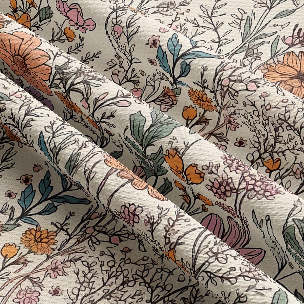 a close-up view of a fabric with a floral pattern. The fabric has a white background with various flowers and leaves in different colors, including pink, orange, and green. The pattern is intricate and detailed, showcasing the craftsmanship of the fabric.
