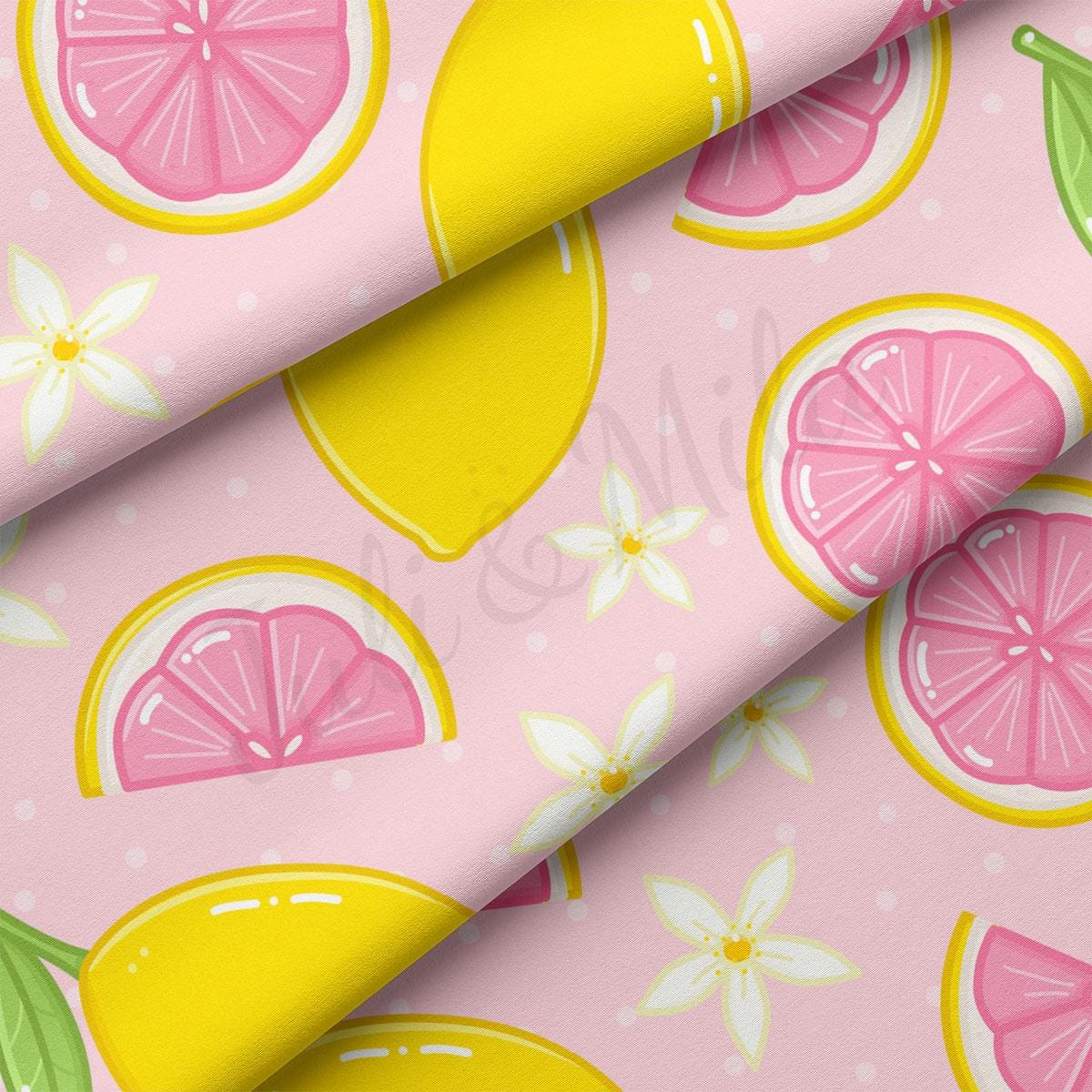 a pink background with lemons and limes on it