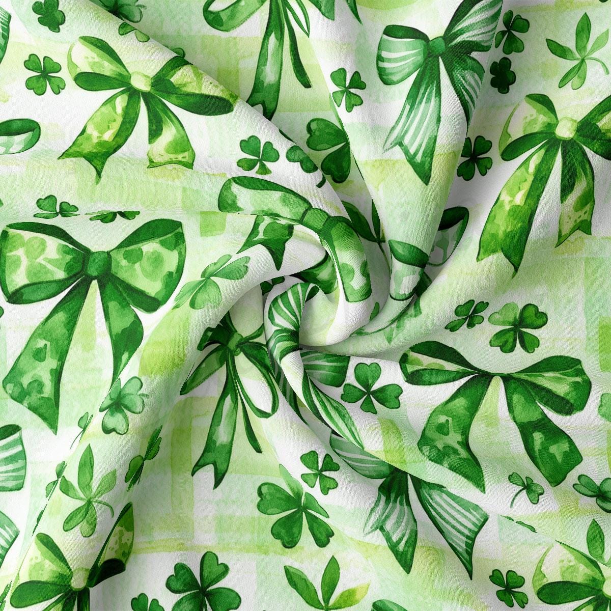 a green and white background with shamrock leaves