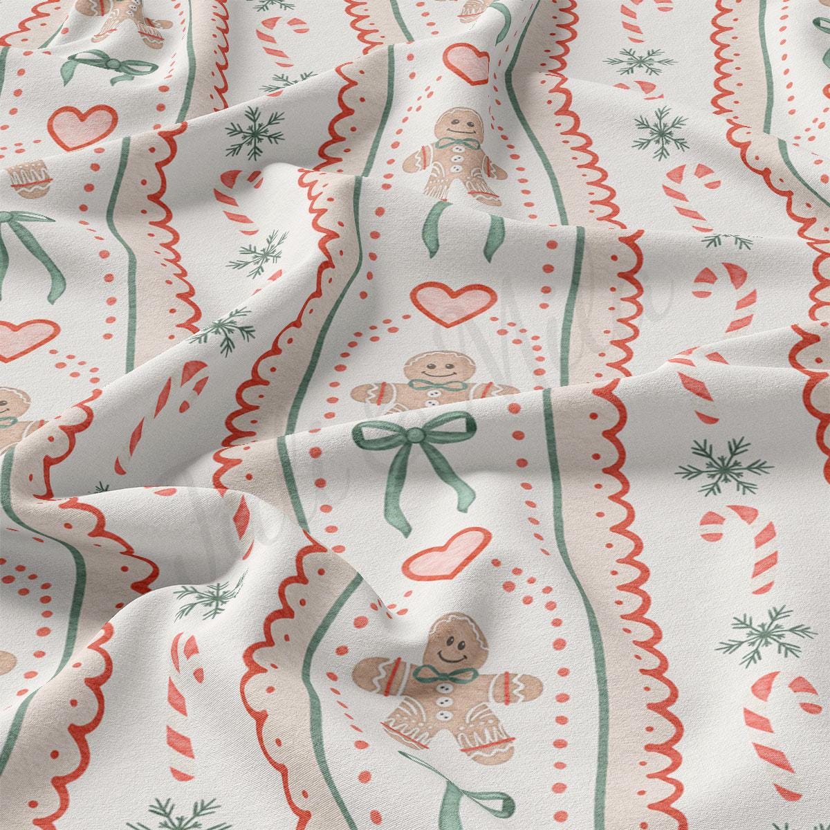 a close-up view of a fabric with a repeating pattern of gingerbread men, hearts, and snowflakes. The pattern is predominantly white with red and green accents, creating a festive and holiday-themed design.