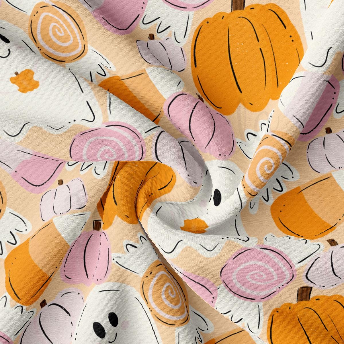 The image is a close-up of a fabric with a repeating pattern of Halloween-themed pumpkins and ghost-like shapes in various shades of orange, pink, and white.