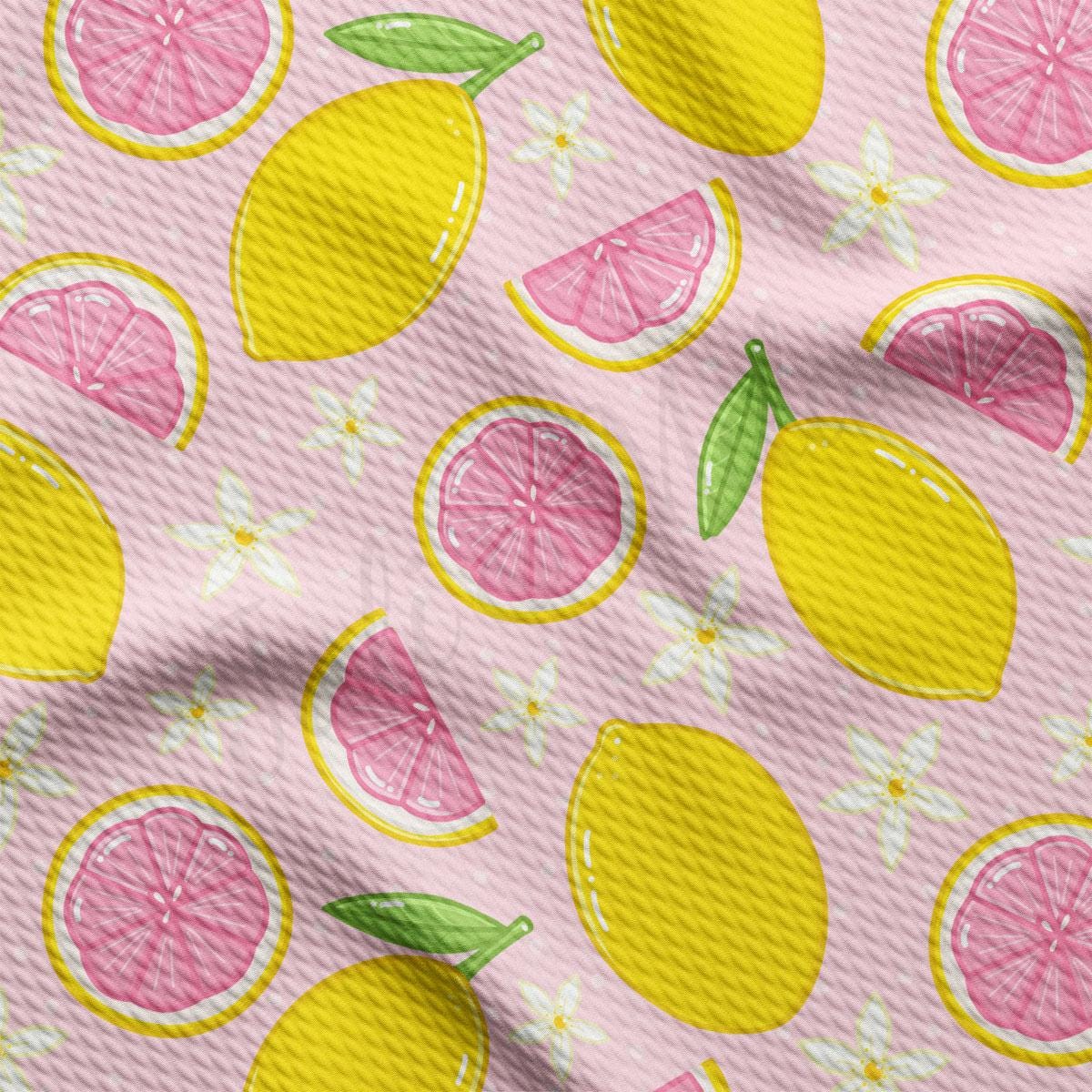 a pink and yellow background with lemons and grapefruits