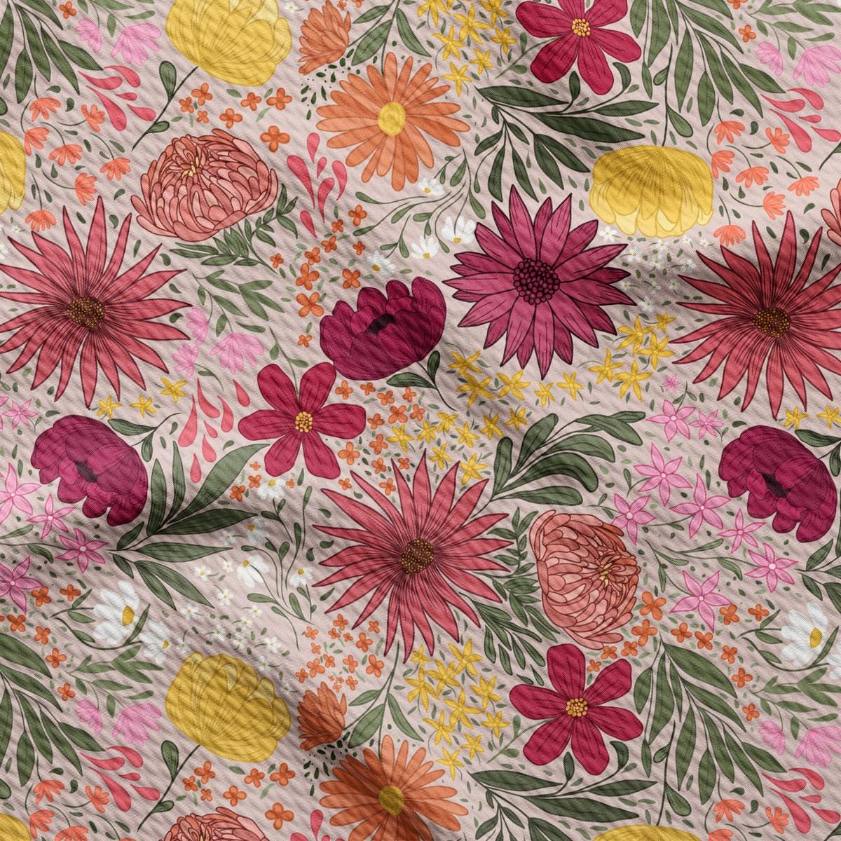 a flowery fabric with many different flowers on it
