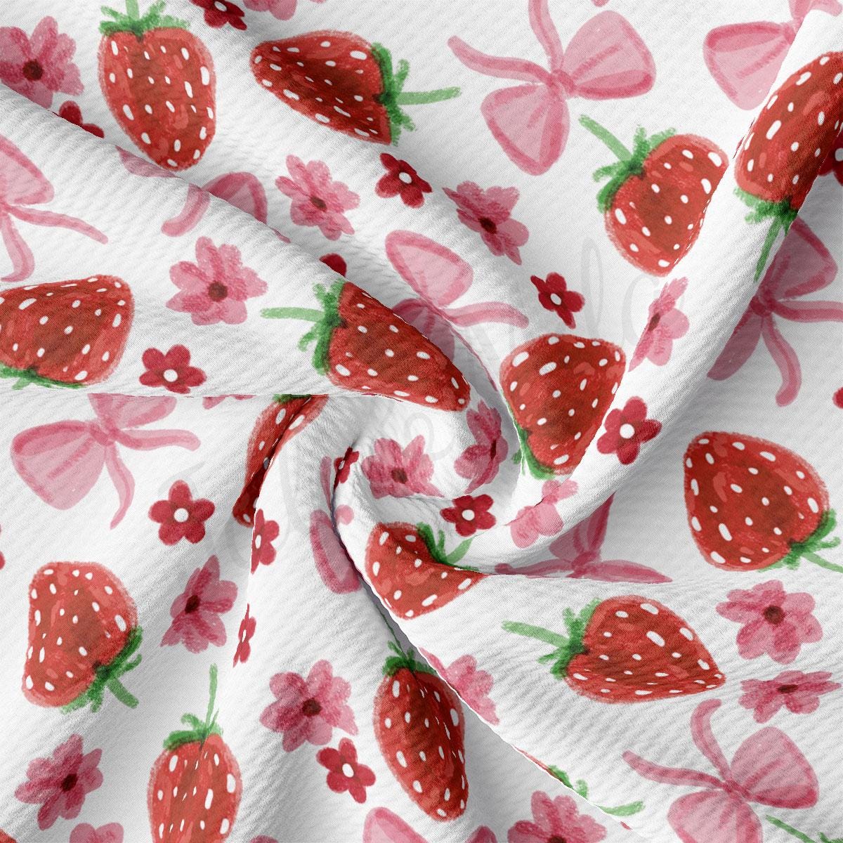 a close up of a fabric with strawberries on it