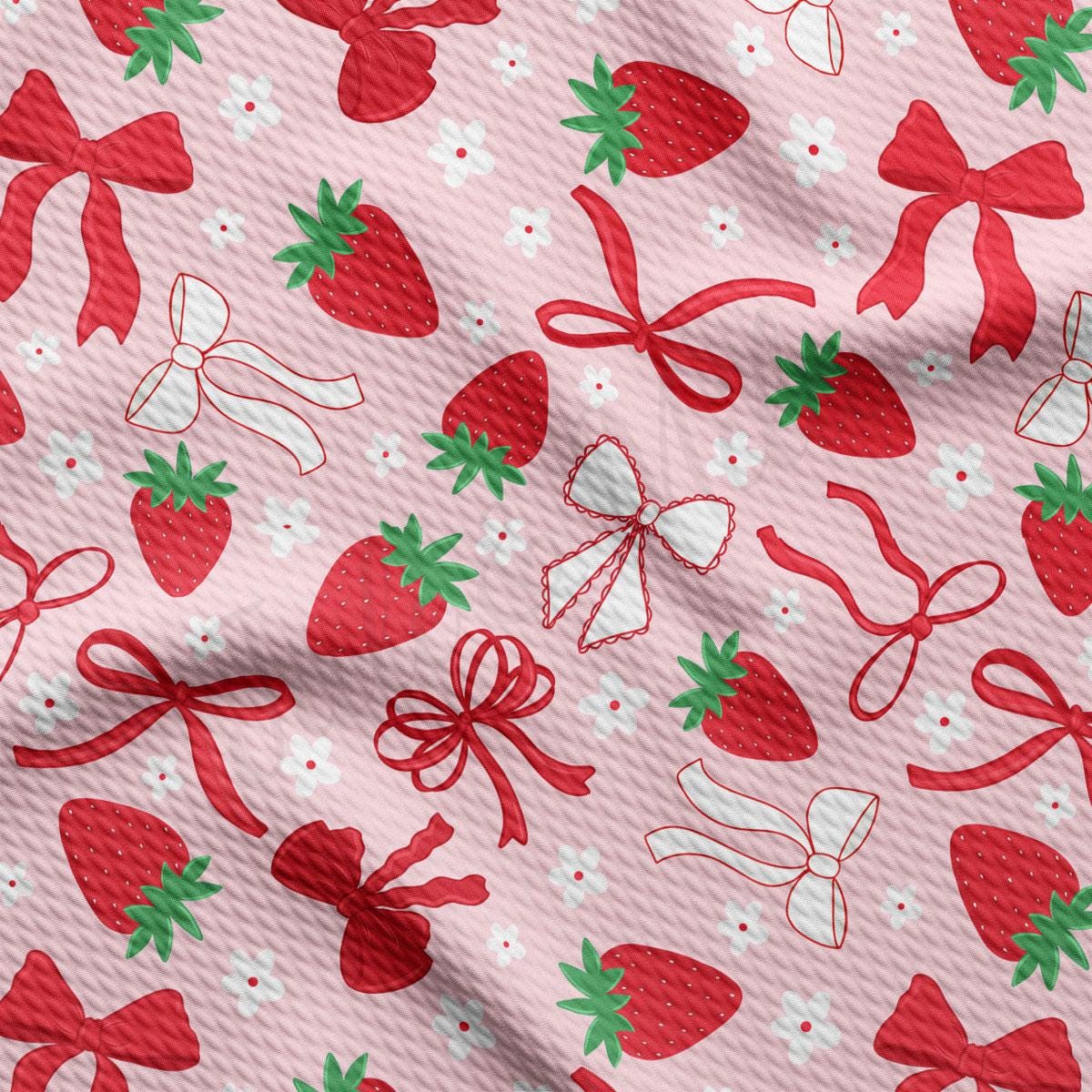 a pink background with red and white bows and strawberries