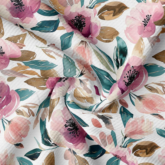 a close-up view of a fabric with a floral pattern. The fabric is white and has a variety of pink, green, and brown flowers and leaves. The pattern is intricate and detailed, with the flowers and leaves overlapping and creating a visually appealing design.