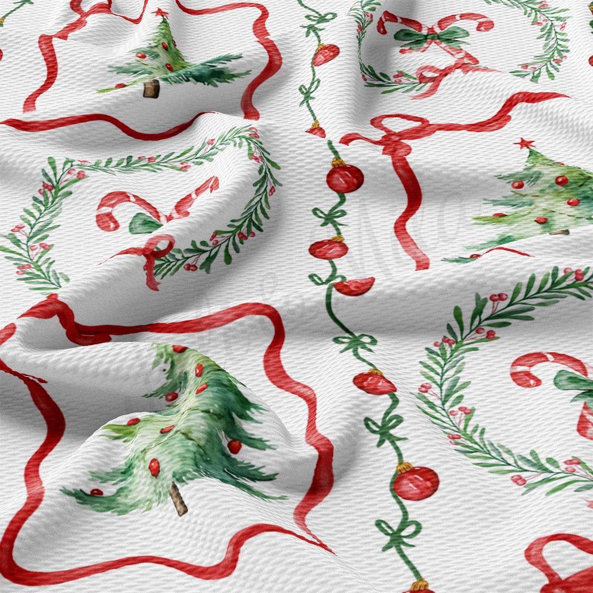 The image is a close-up of a fabric with a Christmas-themed design, featuring various Christmas trees, wreaths, and red ribbons.