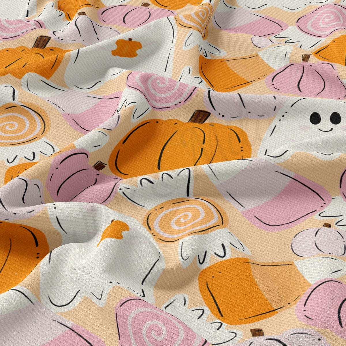 The image is a close-up view of a fabric with a repeating pattern of Halloween-themed pumpkins and a ghost.
