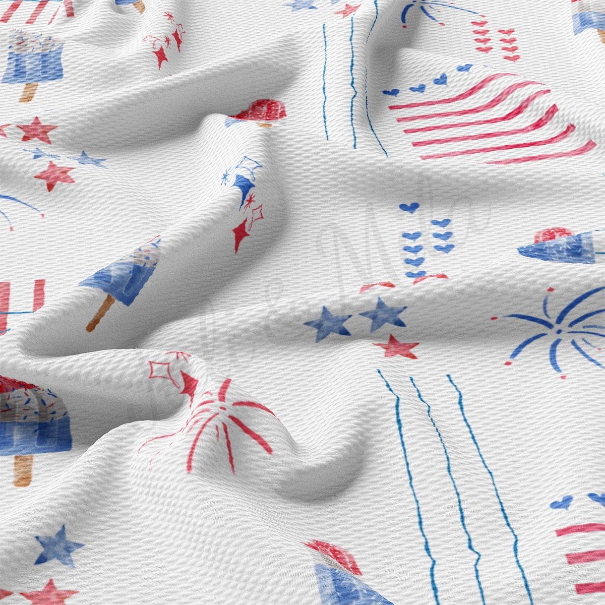 a white fabric with red, white, and blue fireworks