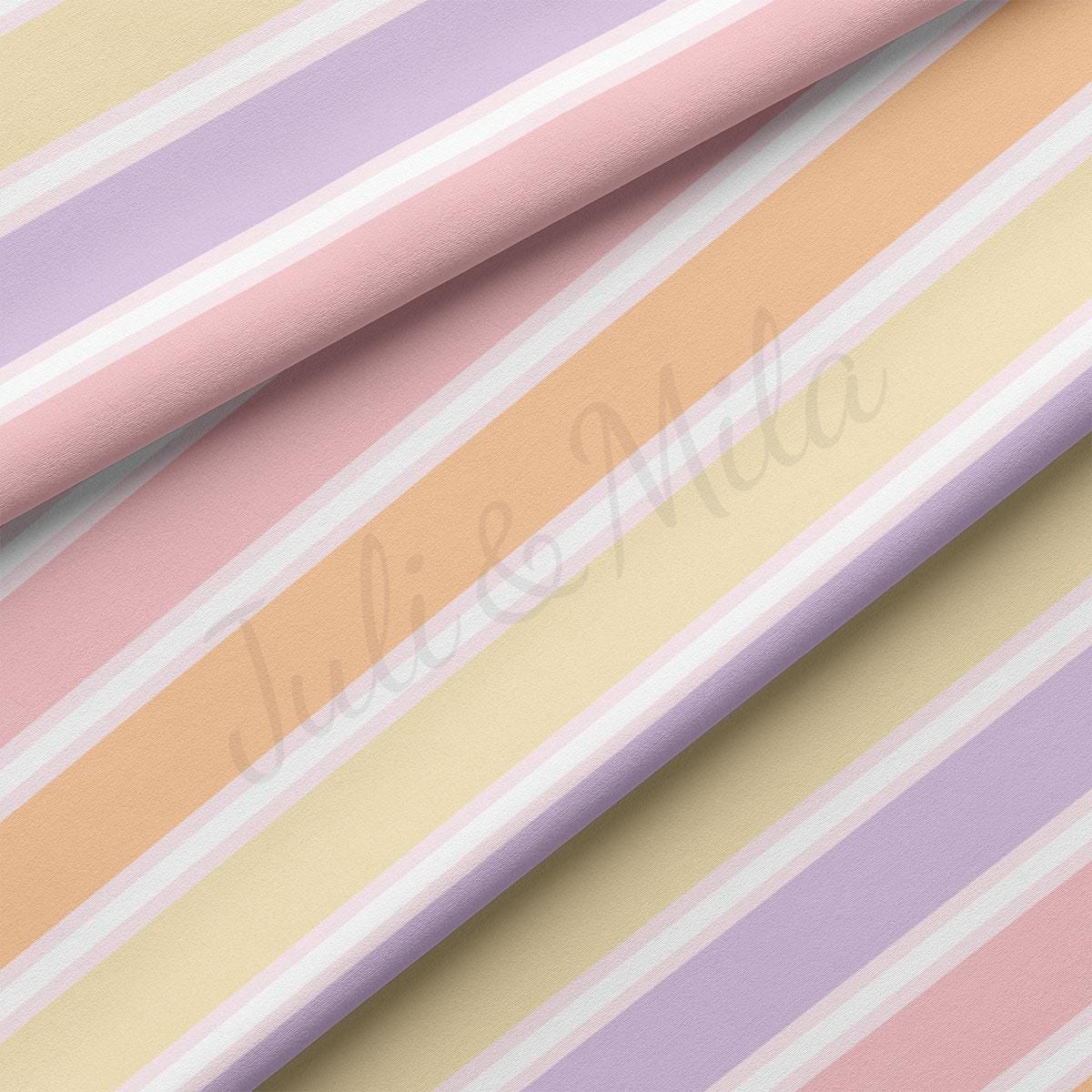 a pink, yellow, and purple striped wallpaper