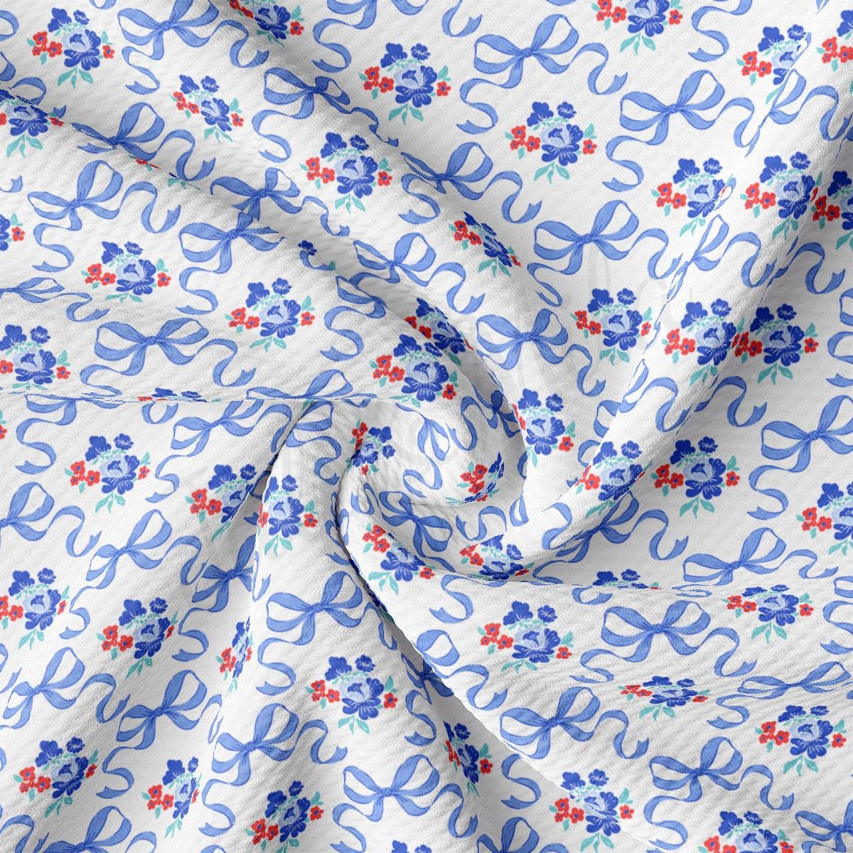 a blue and red floral print on a white background