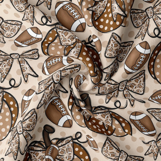 a repeating pattern of brown footballs and brown polka dots on a beige background.