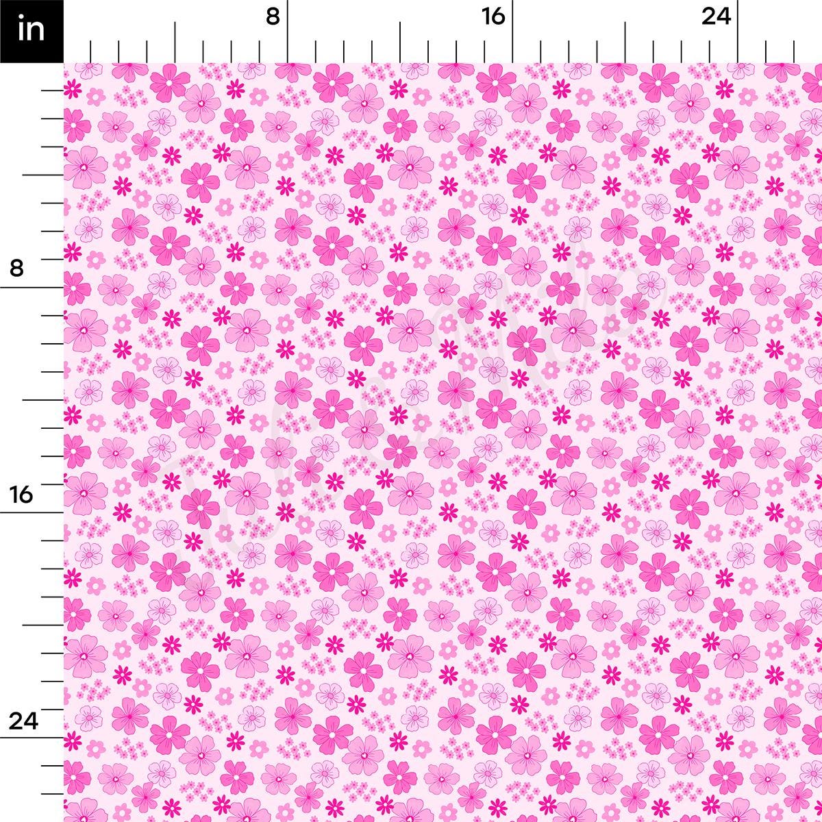a ruler with a pink flower pattern on it