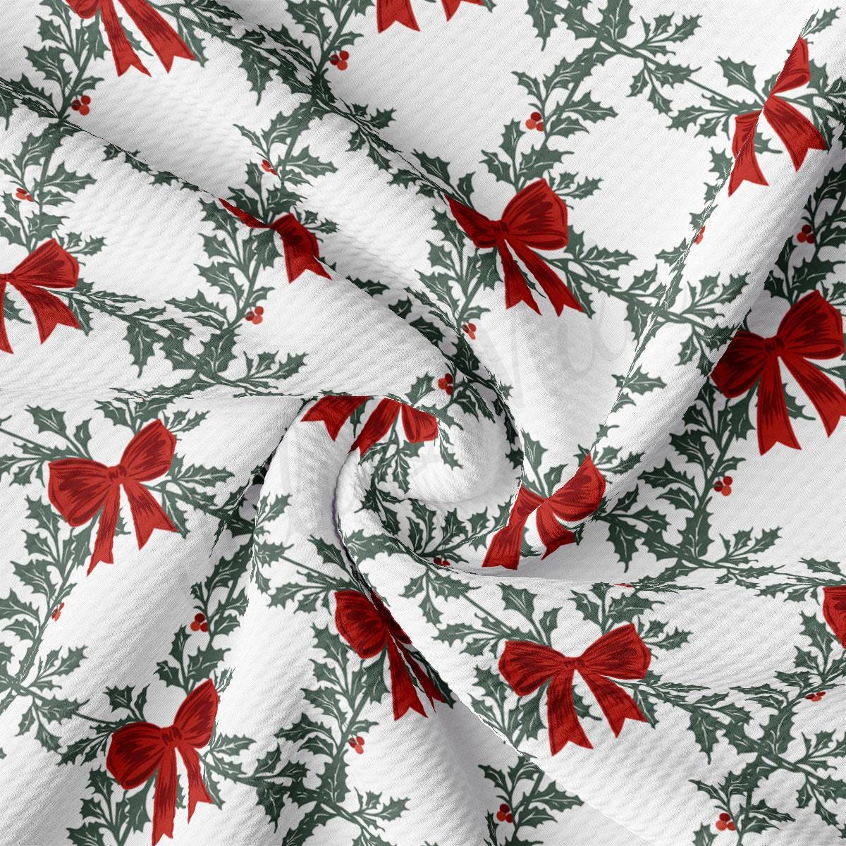 a close-up view of a fabric with a repeating pattern of red bows and green leaves, creating a festive and holiday-themed design.