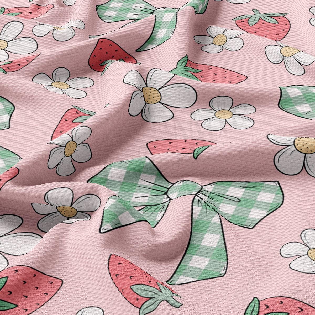 a pink background with a pattern of strawberries and flowers
