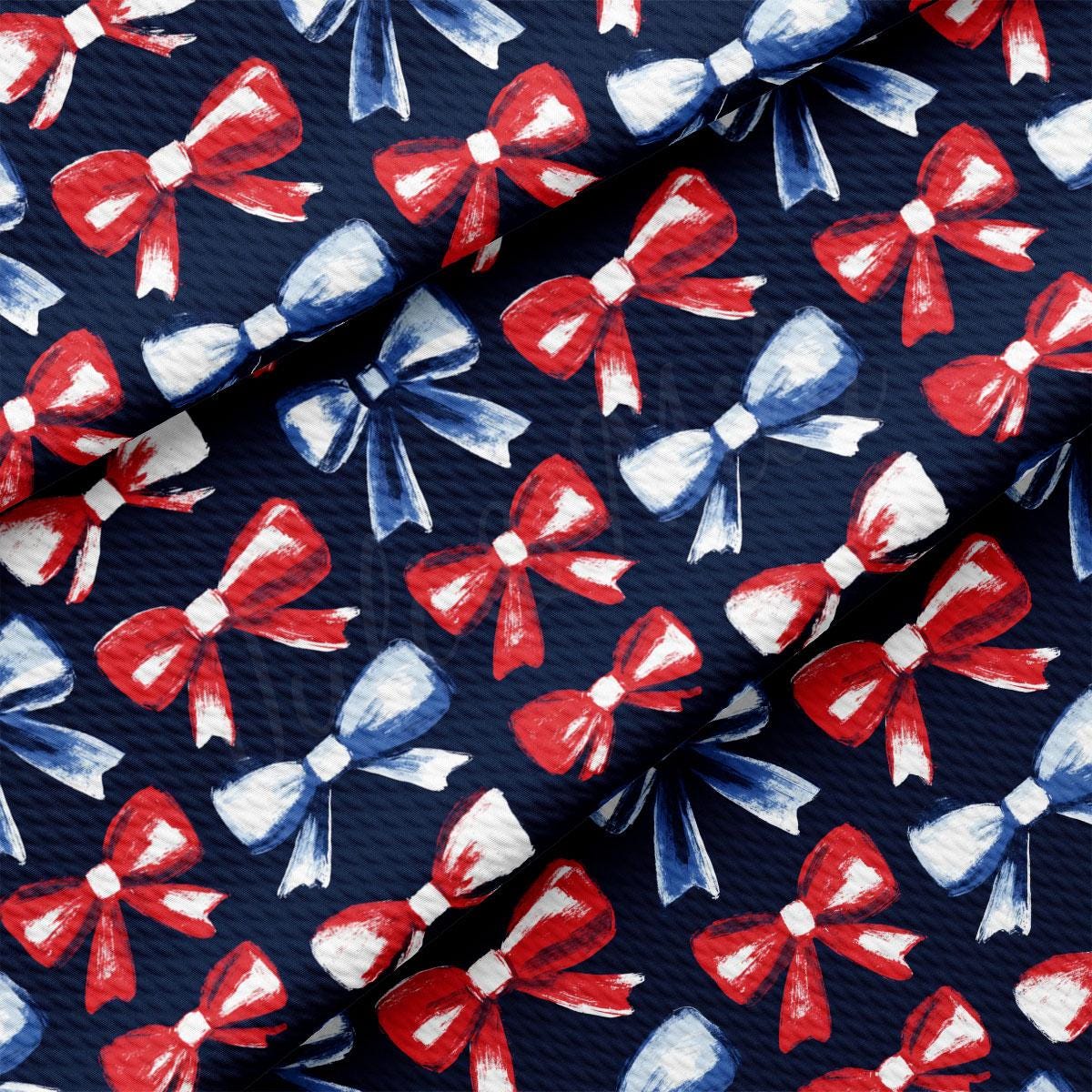a tie with red, white and blue bows on it