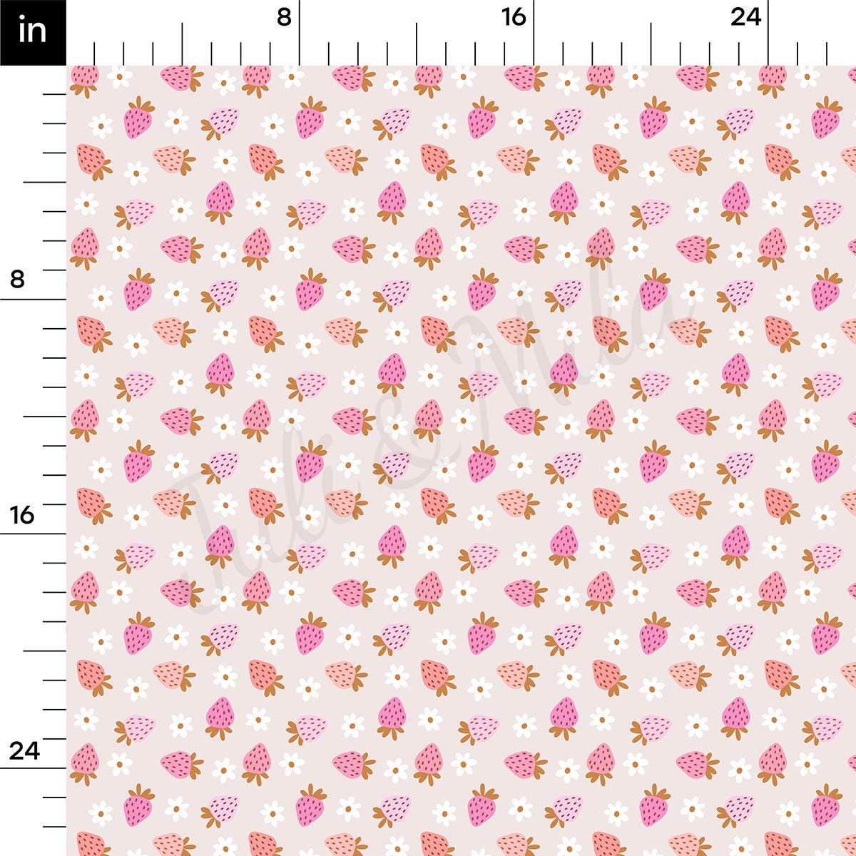a ruler with a strawberry pattern on it