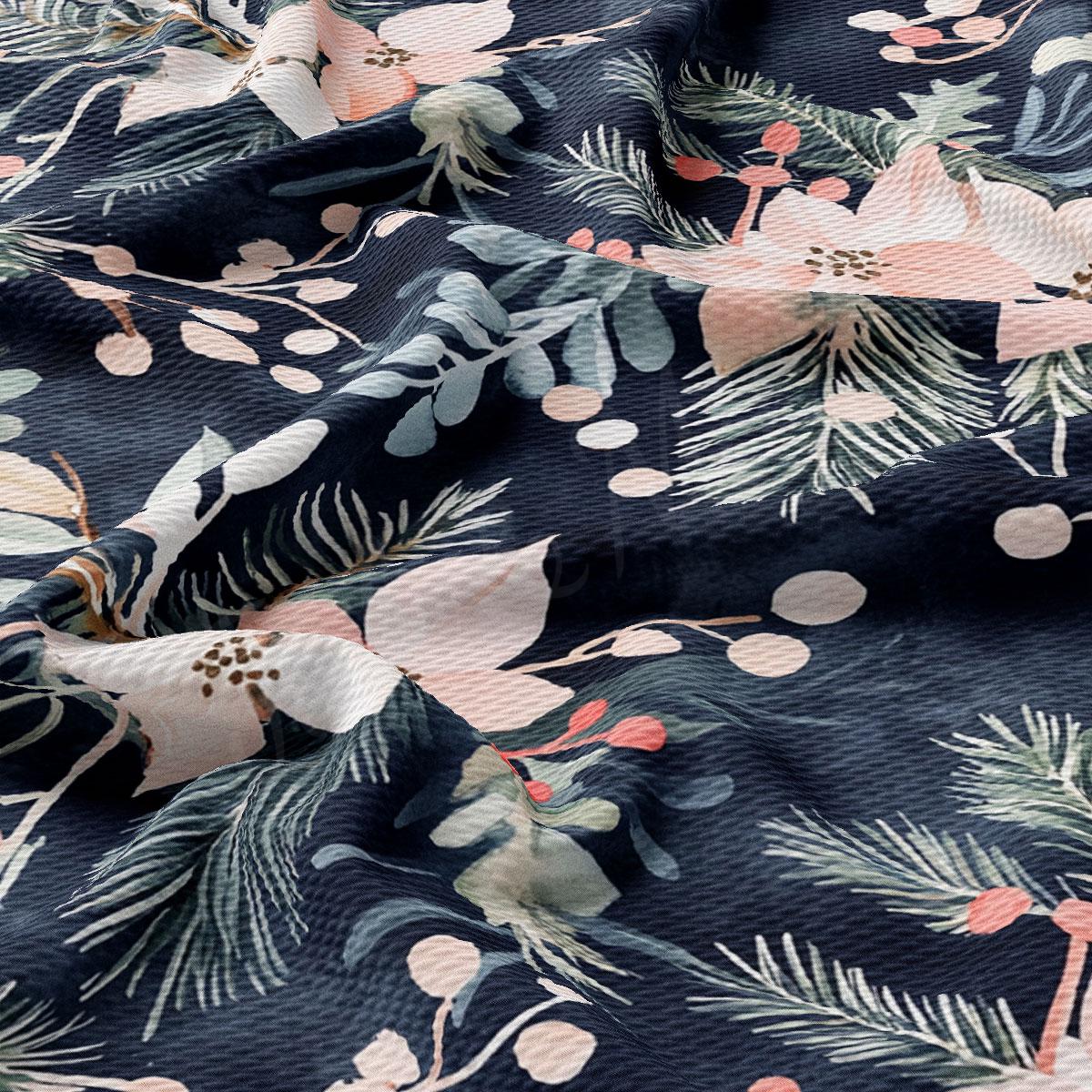 a close-up view of a fabric with a floral pattern in shades of blue, green, and pink. The pattern includes various types of flowers, leaves, and branches, creating a visually appealing and intricate design.
