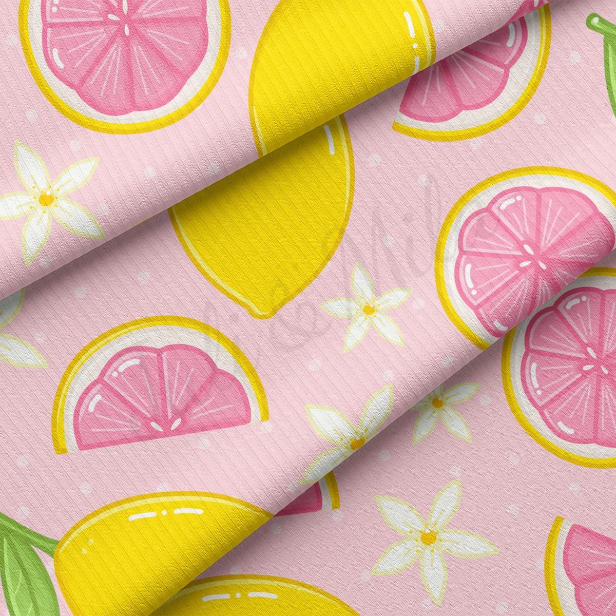 a close up of a pink background with lemons and grapefruits